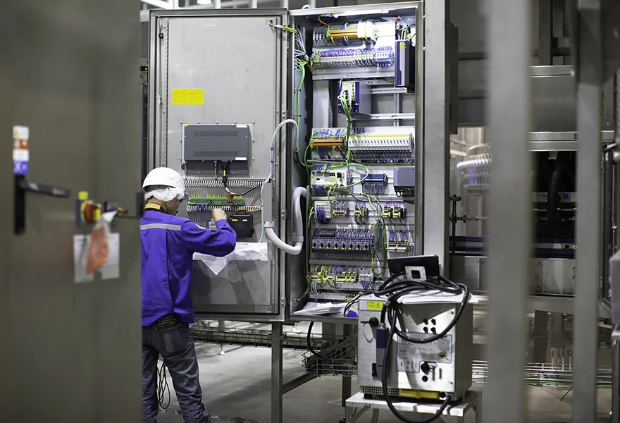 electrician-engineer-tests-electrical-box-control